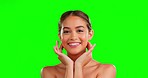 Makeup, beauty and hands on face of woman in studio for wellness, cosmetic and care on green screen background. Skincare, portrait and girl model relax with soft, smooth and luxury treatment isolated
