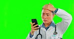 Woman, doctor and phone for bad news in green screen studio with email for medical results. Japanese medic, smartphone and disappointed with report, announcement or communication in hospital mock up