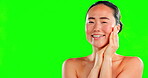Beauty, wink and portrait of asian woman on green screen background for skincare, dermatology and cosmetics. Aesthetic female model with facial self care glow on skin and flirting or smile for mockup