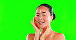 Skincare, face and Asian woman with cream on green screen in studio isolated on a background. Beauty dermatology, cosmetics portrait and happy female model apply product, lotion or moisturizer creme.