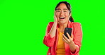 Phone, wow and surprise of woman with green screen isolated on studio background winning, success and news. Face of asian person or winner on cellphone reading announcement, bonus or prize giveaway