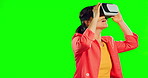 VR goggles, green screen and woman isolated on studio background in metaverse, futuristic or 3d user experience. Virtual reality, high tech and person with creative vision, cyberpunk or digital world