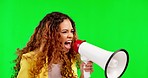 Megaphone, green screen and woman in studio for message, broadcast or freedom, angry and passion. Speaker, microphone and girl protest for change, democracy and justice, shouting and human rights