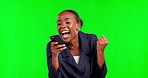Black woman, phone and celebration on green screen for winning, sale or discount against studio background. Happy African American female excited for win, promotion or bonus with smartphone on mockup