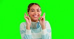 Face, hope and woman with fingers crossed, green screen and happiness with success, lucky and winner. Portrait, female and lady with gesture for wish, luck and victory with smile, win and promotion