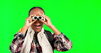 Wow, green screen and binoculars with a black woman in studio sightseeing or bird watching. Hiking, surprise and view with an attractive young female backpacking on chromakey mockup for adventure