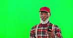 Phone, wow and winner with a senior black man on a green screen background in studio cheering an announcement. Portrait, contact and mobile with a happy mature male reading a good news notification