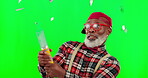 Wow, confetti and a funky black man on a green screen background in studio for a celebration event. Surprise, winner and motivation with a happy senior male celebrating success on chromakey mockup