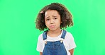 Sad, unhappy and face of a child on a green screen isolated on a studio background. Trouble, crying and portrait of a girl kid on a backdrop with sadness, expression and emotion with mockup space