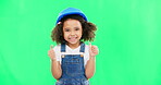 Little girl, thumbs up and construction with safety helmet on green screen for good job against a studio background. Portrait of architect kid showing thumb emoji, yes or like for success on mockup