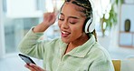 Woman with smartphone, headphones and dancing while listening to music on work break and relax in office social space. Singing along to radio, online streaming and wifi with energy, fun and rhythm