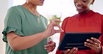 Tablet, hands and women partnership for strategy, planning or discussion for goals, mission or teamwork. Black woman, leader or team talk with mobile touchscreen in modern office for idea development