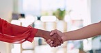 Handshake, women and office for agreement, partnership and collaboration with success in b2b negotiation. Black woman, leader and shaking hands for deal, onboarding and welcome at finance company