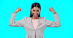 Happy business woman, face and flex arms in studio, blue background and backdrop of freedom. Portrait of female model, bicep and girl power for gender equality, winning and success of job empowerment