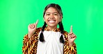 Face, motivation and girl with green screen, pointing and happiness with joy, cheerful and inspiration. Portrait, young person and female child with direction, decision and options with choice or joy