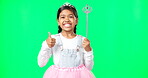 Little girl, princess and thumbs up on green screen for success with magic wand against a studio background. Portrait of happy child or kid with tiara showing thumb emoji, yes sign or like on mockup