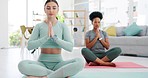 Yoga, women friends and namaste meditation in home living room for mindfulness, peace and wellness. Zen health, pilates and girls meditate with prayer hands, holistic exercise or workout for training