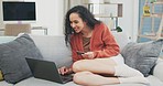 Happy woman, credit card and online shopping on laptop, digital fintech payment and customer budget in lounge. Female, ecommerce and computer banking for finance, cash investment and website sales 