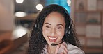 Woman, call center and consulting at night in customer service, telemarketing or support at the office. Happy and friendly female consultant agent working late with headphones and mic for online help