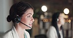 Crm, communication or woman consulting in call center helping, speaking or talking at customer support. Microphone, night or sales consultant in telemarketing or telecom company in a conversation