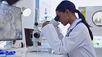 Medical, microscope check and woman scientist doing research for dna and laboratory work for science. Lab worker, analytics and biotechnology of a clinic employee working on health development