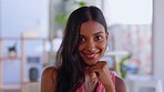 Woman, smile and face in office at laptop for happiness, motivation and planning at desk. Indian female worker, portrait and happy for business working at computer with pride, confident and startup