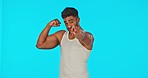 Gym, fitness and man pointing at space on green screen for information or muscle building tips in studio. Mockup, exercise announcement or motivation by Indian personal trainer or sports instructor.