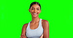 Face, happy and fitness woman with arms crossed on green screen for workout, health training or exercise pride. Sports portrait, personal trainer and confident athlete on isolated mockup for about us