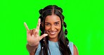 Rock, face and woman in a studio with green screen with a punk hand gesture and smile. Happy, love gesture and portrait of an Indian female model with a heart shape isolated by chroma key background.