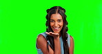Wink, woman face and blowing kiss on green screen, background and studio for love, care and flirting. Portrait of happy model, air kissing and smile on backdrop, happiness and emoji on valentines day