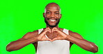 Happy, heart hands and love with black man in green screen studio for romance, pride and hope. Kindness, thank you and showing positive gesture with male on background for care, happiness and joy