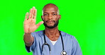 Stop, serious and hand with nurse in green screen studio for medical emergency, protest and discrimination. Defend, warning and reject with black man in background for negative, no or healthcare ban