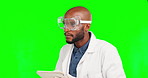 Science test tablet, black man and scientist focus on scientific experiment, lab research or medical development. Green screen laboratory, focus study and chroma key male typing on studio background