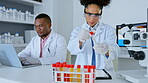 Woman, scientist and tablet with vial sample for testing, examination or scientific research in laboratory. Female in science working on touchscreen with test tube for experiment or medical results