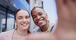 Selfie, friends and couple in the city, interracial and bonding with smile, quality time and carefree. Portrait, black man and woman in town, outdoor and take picture for memories and loving together