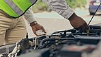 Oil change, car trouble and man hands working on a mechanic and transport quality control job. Professional engine check and garage service of a maintenance employee with auto repair outdoor