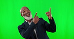 Showing, looking and a black man pointing on a green screen isolated on a studio background. Happy, advertising and an African businessman showing mockup space with a gesture on a chromakey backdrop