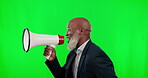 Megaphone, green screen and black man isolated on studio background broadcast, breaking news and announcement. Senior business person with loud speaker sound for sale, promotion deal or voice mockup