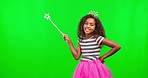 Face, green screen and girl with wand, princess and pointing to space against a studio background. Portrait, female child and young person playful, dress up and Halloween fairy tale outfit for joy