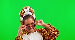 Green screen, sunglasses and child with tiger costume, cool accessory and onesie with funky attitude. Halloween fashion, studio and portrait of happy girl with smile for comic, funny and emoji meme