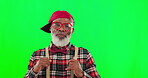 Cool, stylish and face of a black man on a green screen isolated on a studio background. Retro, fashion and portrait of a senior African person in vintage, fashionable and trendy clothing with mockup