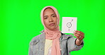 Green screen, gender and woman with equality sign, paper and symbol isolated in a studio background holding an icon. Serious, Muslim and portrait of female showing symbol for freedom or empowerment