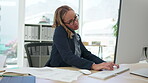 Asian woman, phone call and multitasking in busy business schedule on computer with paperwork at office desk. Fast female employee rushing work or tasks in productivity or efficiency at the workplace