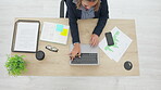 Woman, laptop and analytics in planning above for corporate strategy, graph or statistics on office desk. Top view of female analyst working on computer with company chart writing data at workplace