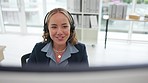 Asian woman, call center and face consulting with headphones on computer for customer service or support. Happy female consultant agent with smile talking on PC headset for online advice at workplace