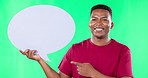 Green screen, speech bubble and face of black man pointing to mockup, space and billboard on empty background. Portrait, banner and happy guy with social media, news and advertising on isolated space