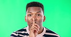 Black man, finger and lips by green screen, silent and face to stop noise, talking or gossip by studio background. Male, model and gen z student with hand gesture for portrait, secret or information