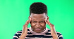 Black man, headache and pain on green screen with burnout, stress and anxiety on studio background. Massage temple, agony and suffering with health, migraine and young male is hurt with mockup space