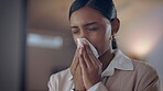 Indian woman, working night and blowing nose, sick with allergies and cold or flu, virus and health. Deadline, overtime and burnout with illness, female lawyer work late, hayfever or sinus problem