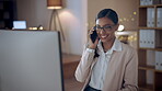 Phone call, computer and a designer woman at work during the night to complete a project by deadline in her office. Mobile, communication or design with a female employee working in a creative agency